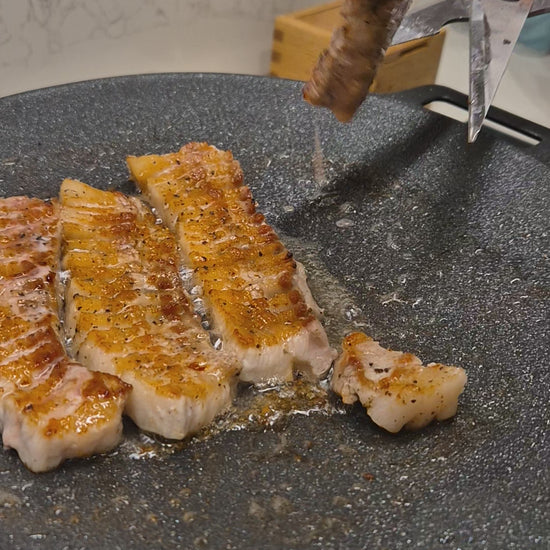 Pork belly at home on the griddle pan